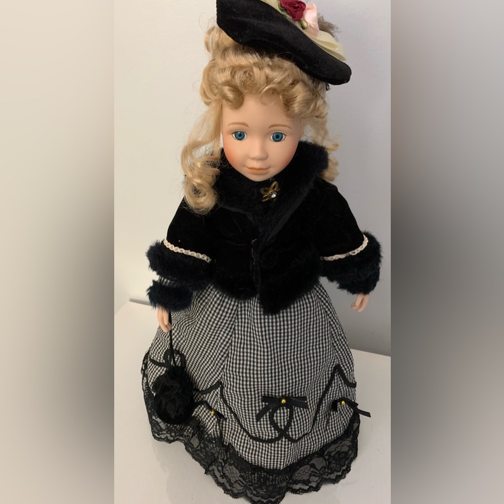Vintage porcelain head and hands doll.